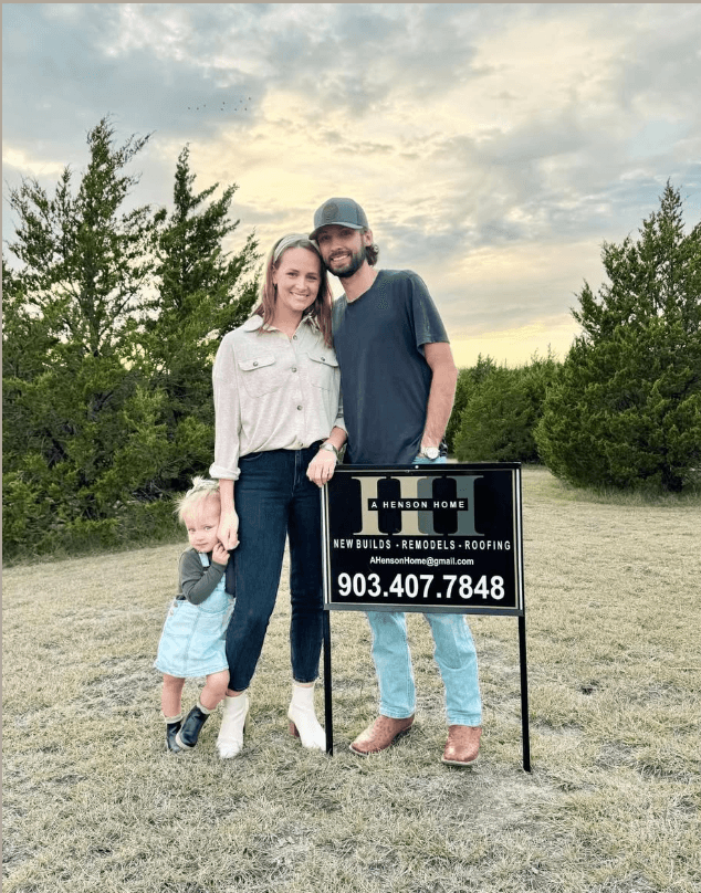 The Henson family at a construction site